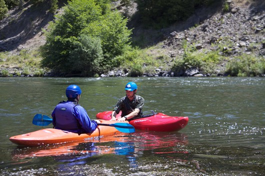 Drew doing a demonstration for new kayaker Brian Drew doing a demonstration for new kayaker Brian