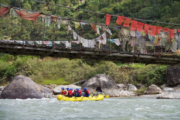 Rafting Below a Footbridge on the Pho Chhu Rafting Below a Footbridge on the Pho Chhu