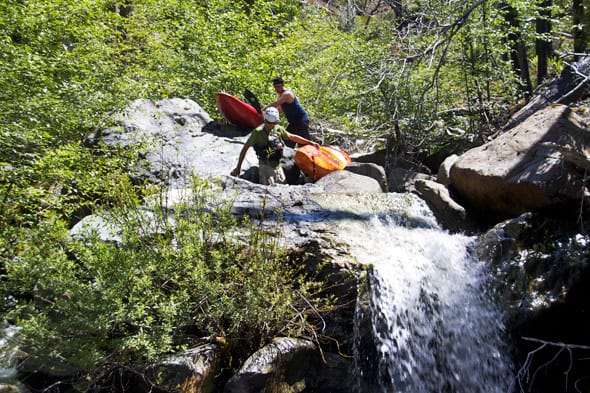 Carrying our boats down Slide Creek