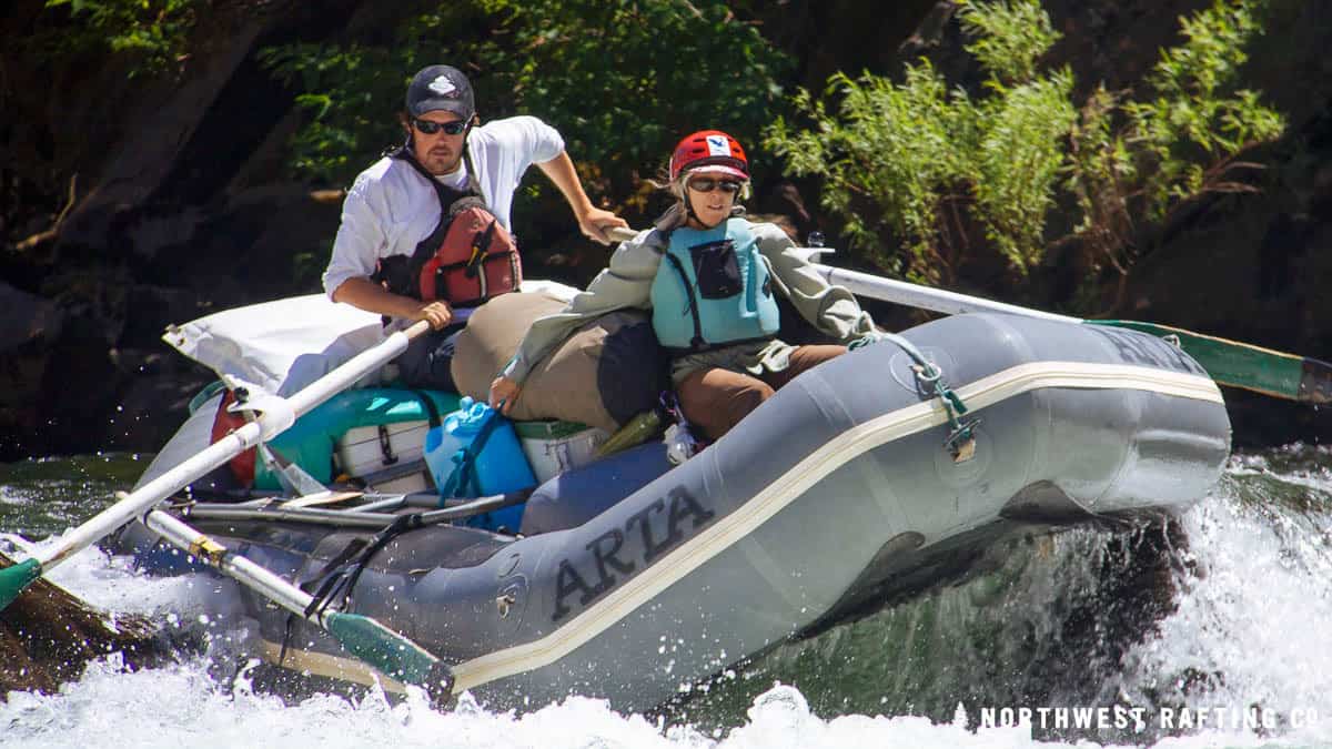The author rowing a raft on California's Tuolumne River