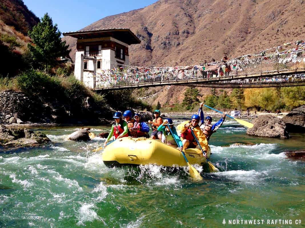 Rafting below a 600 year old bridge on Bhutan's Paro Chhu