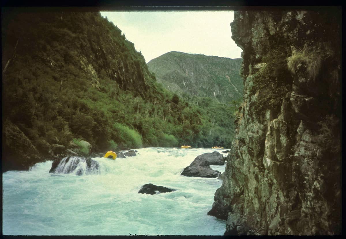 All 4 boats started close together above Throne Room We were calling this rapid by the local's name, "Salto Feo." The first raft accelerated so fast that it is almost through the rapid and the other boats have barely moved.