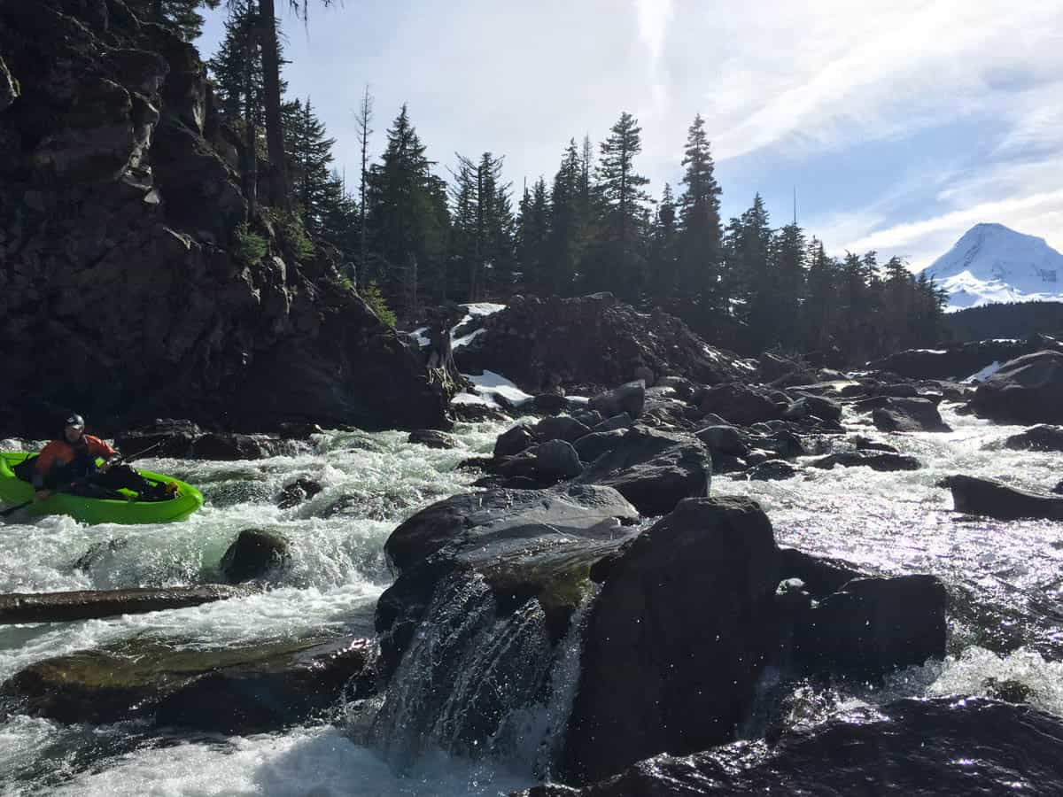 Kayaking on the Middle Fork Hood River with Mount Hood In the Background