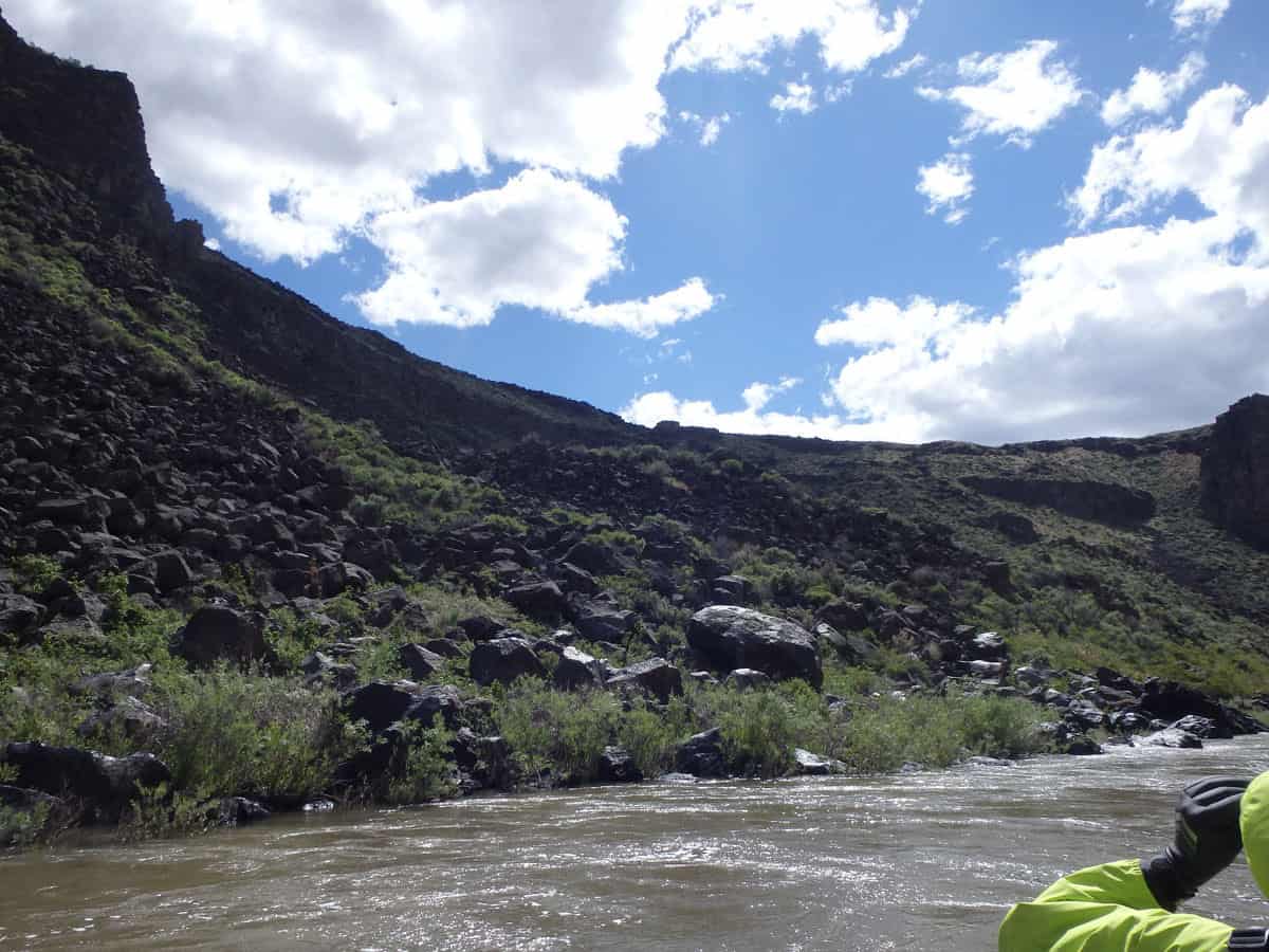 Figure 8. Mile 13, River Left, there are several piles of basalt from landslides.