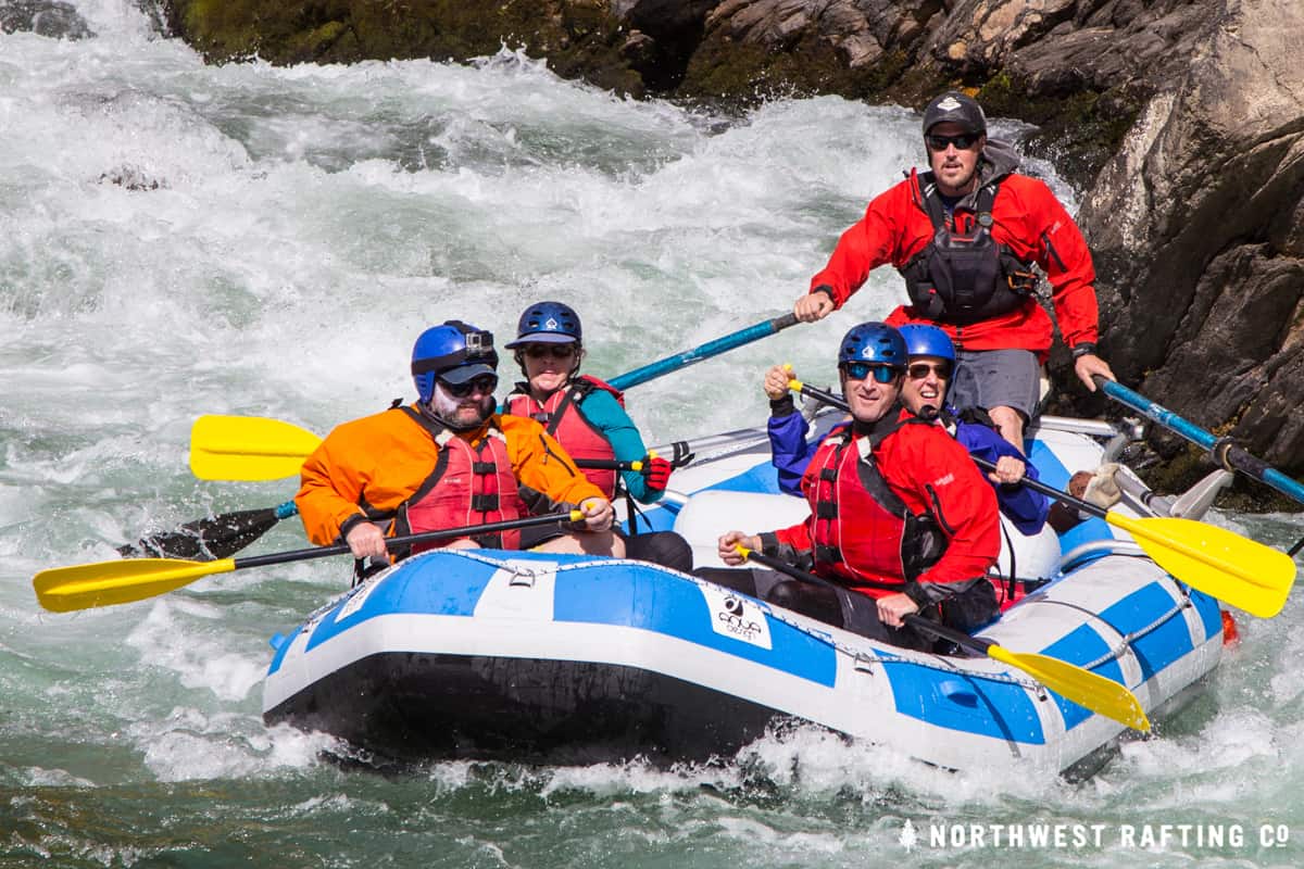 Paddle jackets and rain jackets on the Paro Chhu in Bhutan