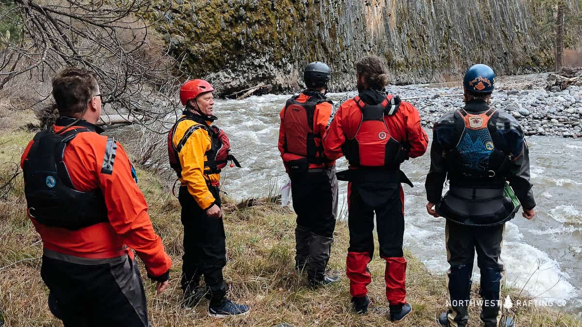 A variety of whitewater PFDs