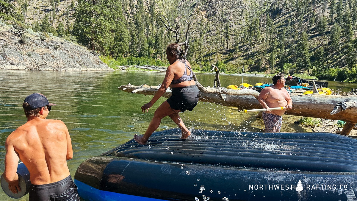 Kim demonstrating advanced technique on the upside down raft waterslide