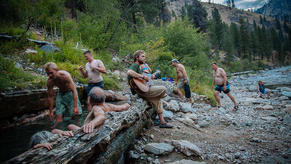 Playing guitar at the Loon Creek Hot Spring