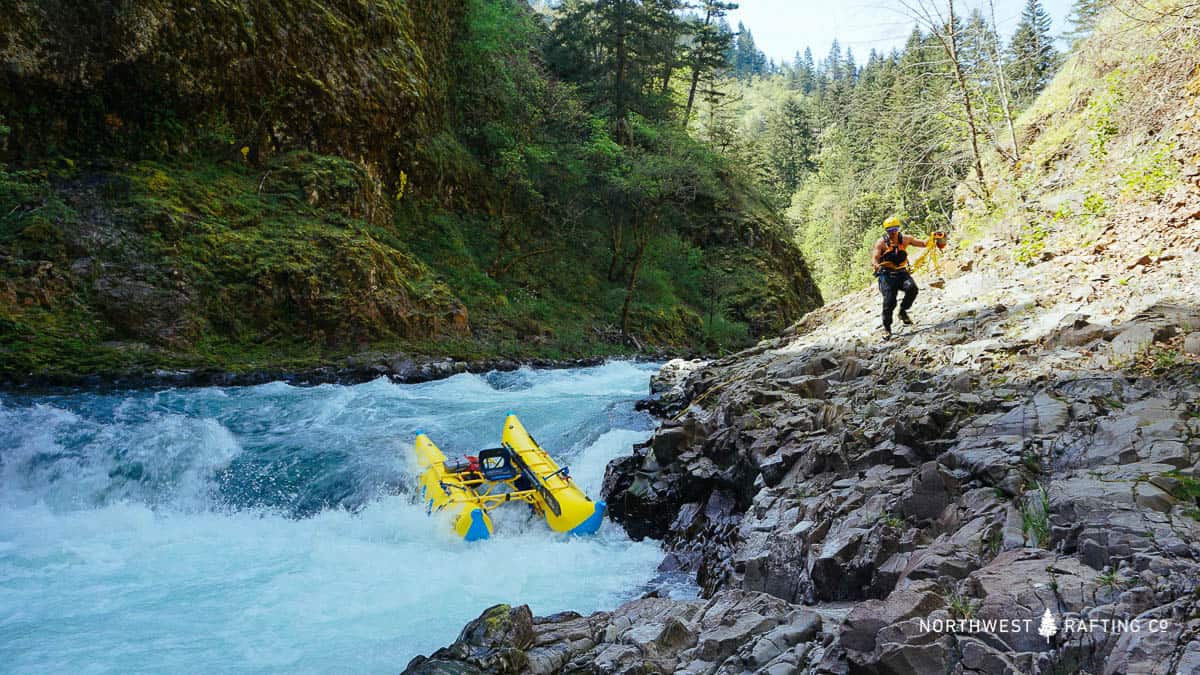 Rafter lining their boat through Steelhead Falls