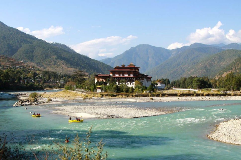 At the confluence of the Mo Chhu and Po Chhu with the Punakha Dzong in the background At the confluence of the Mo Chhu and Po Chhu with the Punakha Dzong in the background