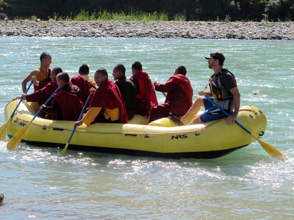 "Remember that time we took monks rafting on the Po Chhu?" "Remember that time we took monks rafting on the Po Chhu?"