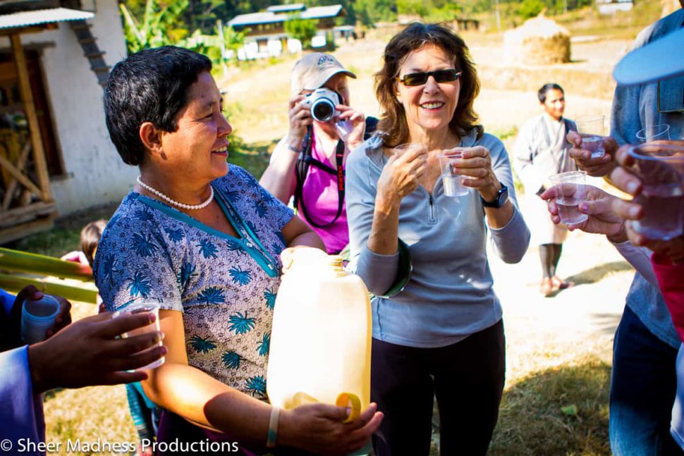 Enjoying some unexpected rice wine along the Pho Chhu Enjoying some unexpected rice wine along the Pho Chhu