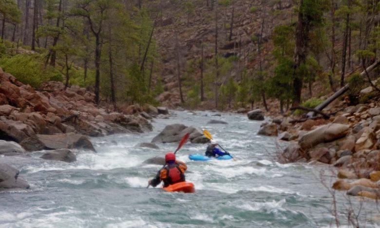 J.R. and Lori paddling the North Fork of Rough and Ready Creek