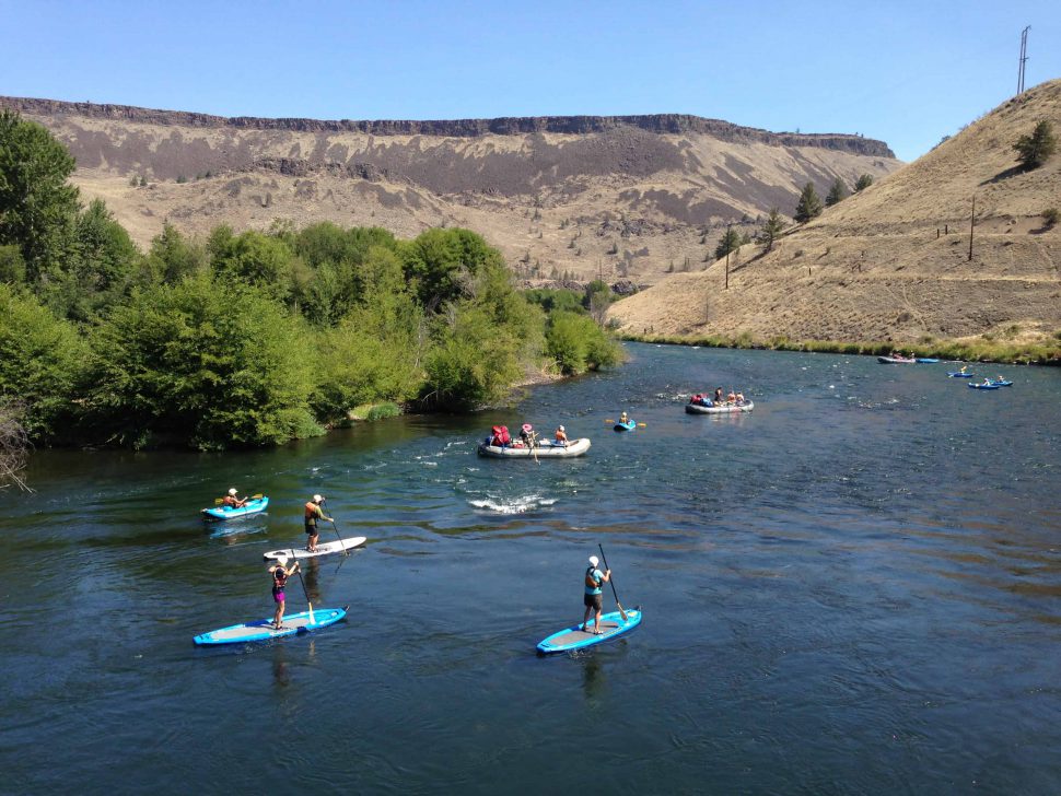 Rafts, Kayaks, and Stand Up Paddleboards on the Deschutes River