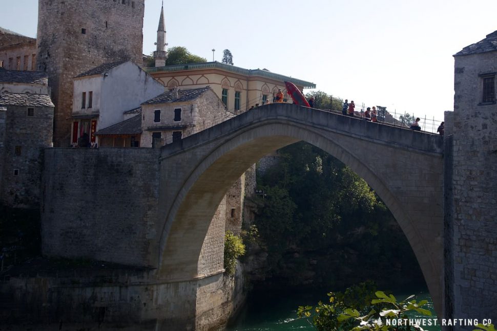 Walking over the Stari Most in Mostar, Herzegovina