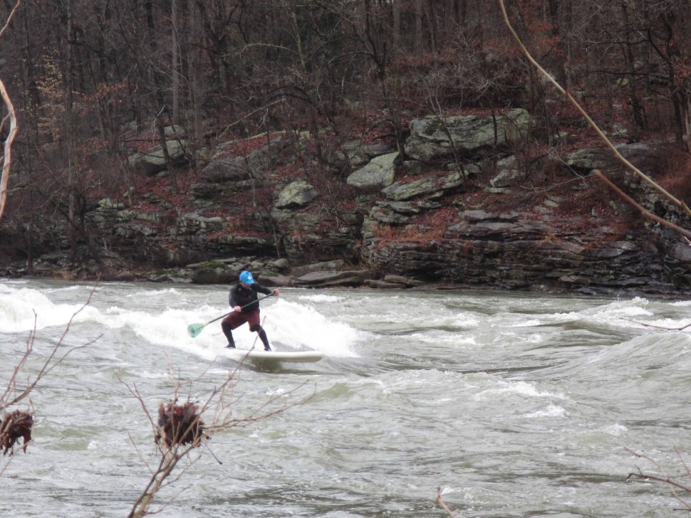 Ian Smith surfing the ULI Mini Quad on the New River Dries