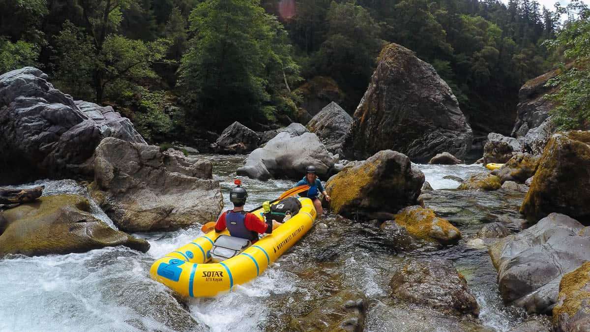 Kayak above Conehead Rapid on the Chetco River