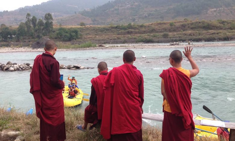 Bhutanese Monks saying hello to us on the Pho Chhu