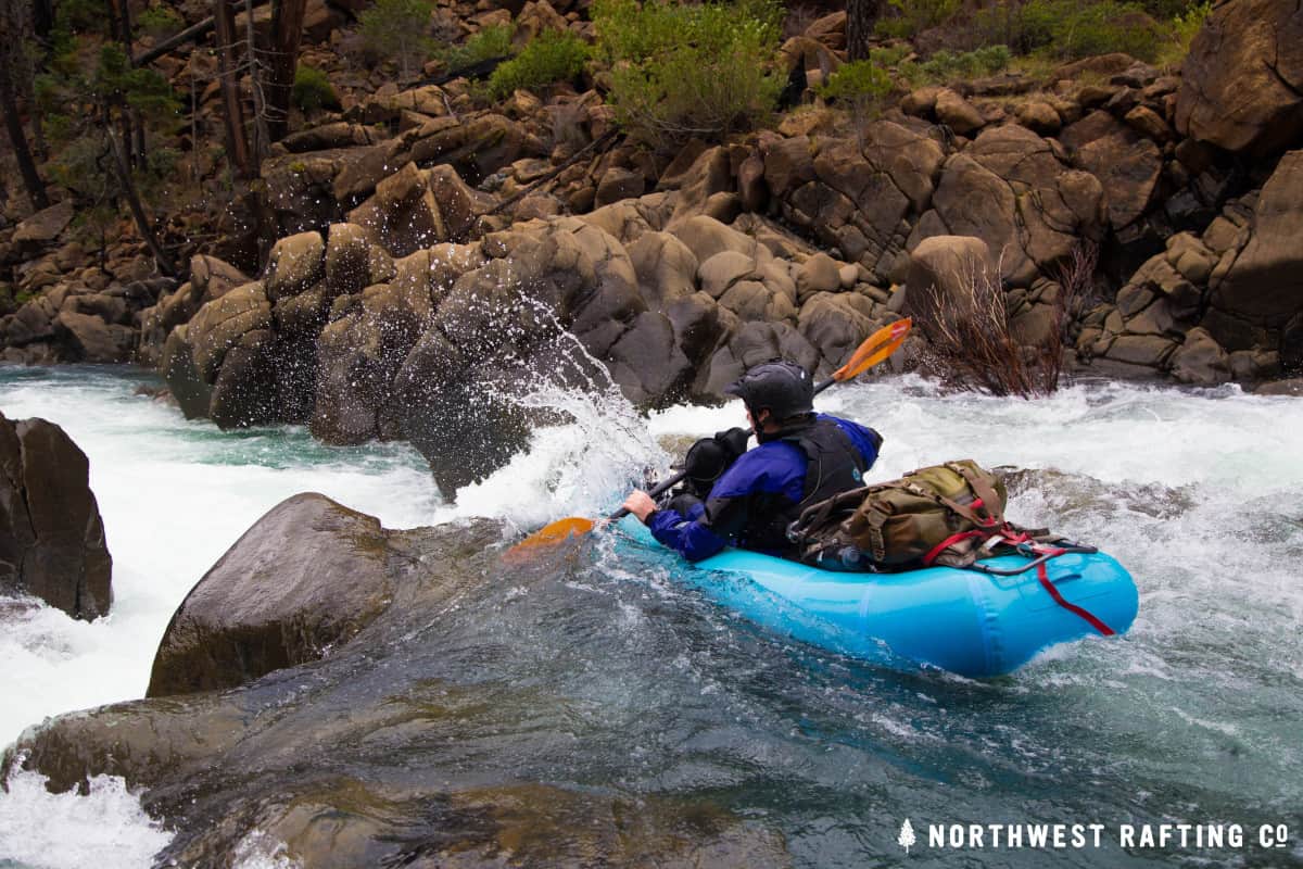 Nate Wilson paddling over Darlingtonia Falls