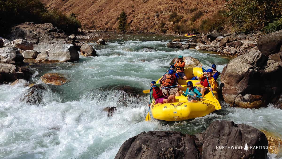 Rafting one of the many Class III rapids on the Paro Chhu