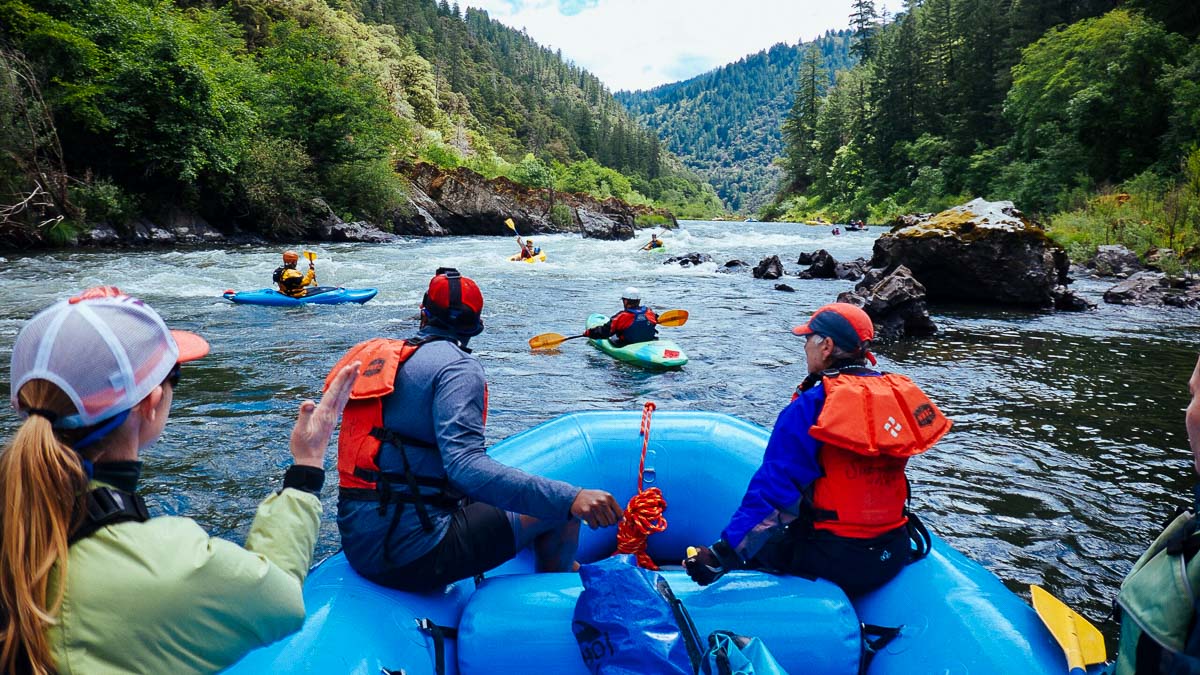 Rafts and kayaks on the American Whitewater Rogue River Trip