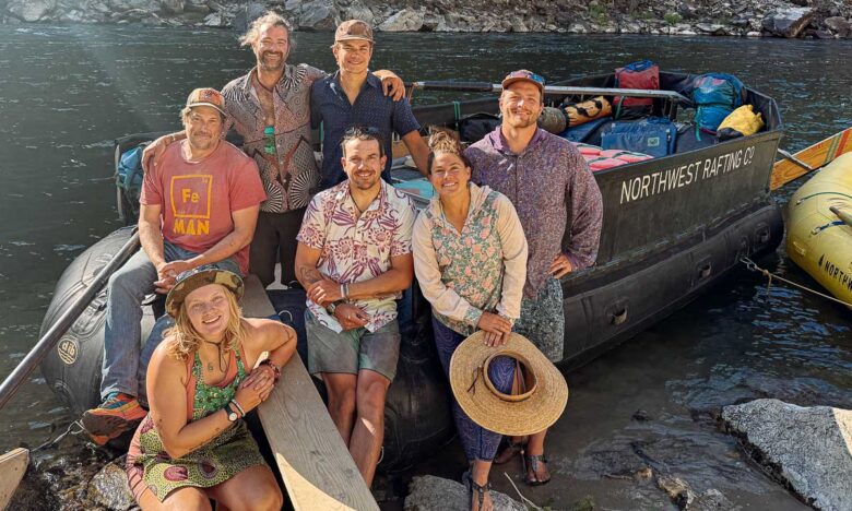 Group photo with a Middle Fork Sweep Boat in the background